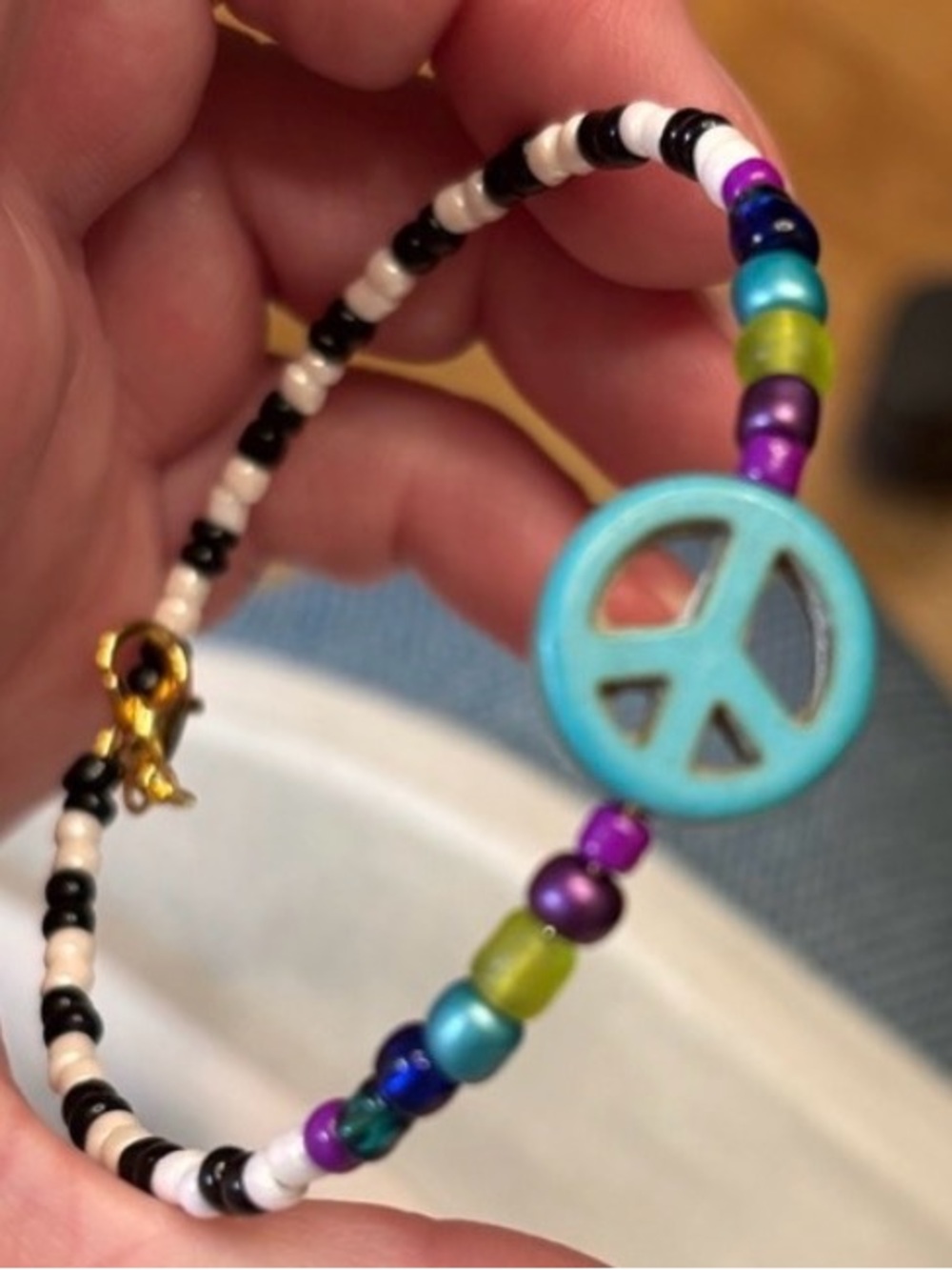 New hand beaded bracelet with peace sign black n white stripes bold colors
